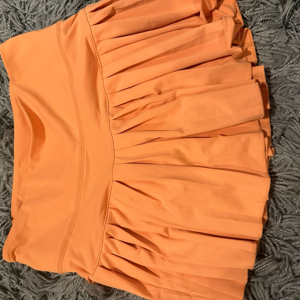 Orange Pleated Mini Skirt